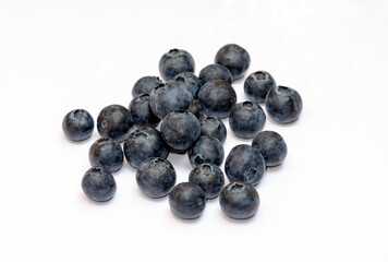 Fresh aromatic blueberries on a white background