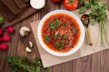 photo for menu, Ukrainian and Russian traditional beetroot soup - borscht with sour cream garlic pepper and sauce, Ukrainian borscht with sour cream, food background, Food and health