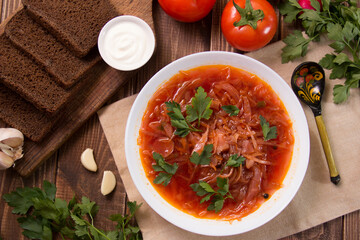 photo for menu, Ukrainian and Russian traditional beetroot soup - borscht with sour cream garlic pepper and sauce, Ukrainian borscht with sour cream, food background, Food and health