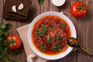 photo for menu, Ukrainian and Russian traditional beetroot soup - borscht with sour cream garlic pepper and sauce, Ukrainian borscht with sour cream, food background, Food and health