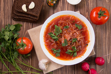 photo for menu, Ukrainian and Russian traditional beetroot soup - borscht with sour cream garlic pepper and sauce, Ukrainian borscht with sour cream, food background, Food and health