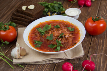 photo for menu, Ukrainian and Russian traditional beetroot soup - borscht with sour cream garlic pepper and sauce, Ukrainian borscht with sour cream, food background, Food and health