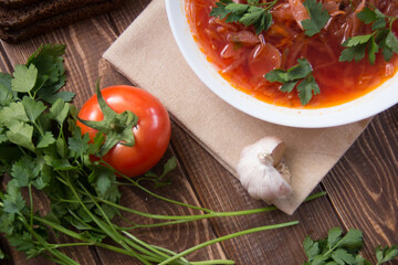 photo for menu, Ukrainian and Russian traditional beetroot soup - borscht with sour cream garlic pepper and sauce, Ukrainian borscht with sour cream, food background, Food and health