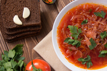 photo for menu, Ukrainian and Russian traditional beetroot soup - borscht with sour cream garlic pepper and sauce, Ukrainian borscht with sour cream, food background, Food and health