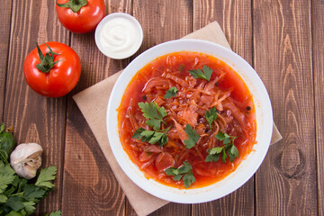 photo for menu, Ukrainian and Russian traditional beetroot soup - borscht with sour cream garlic pepper and sauce, Ukrainian borscht with sour cream, food background, Food and health