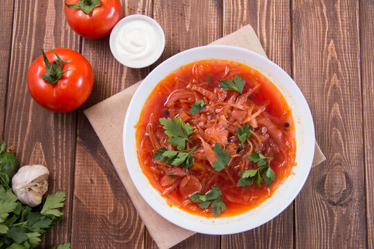 photo for menu, Ukrainian and Russian traditional beetroot soup - borscht with sour cream garlic pepper and sauce, Ukrainian borscht with sour cream, food background, Food and health