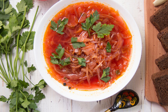 photo for menu, Ukrainian and Russian traditional beetroot soup - borscht with sour cream garlic pepper and sauce, Ukrainian borscht with sour cream, food background, Food and health