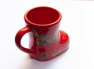 Decorative boot for threads with Christmas motifs on a white background
