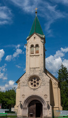 Fototapeta na wymiar the old chapel in Ljubljana against the blue sky