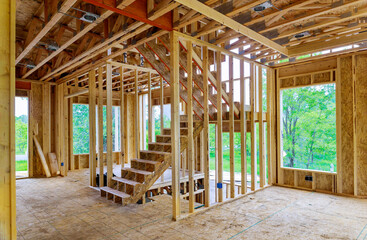 Obraz premium Beams the view of interior of frame house under construction residential house in American