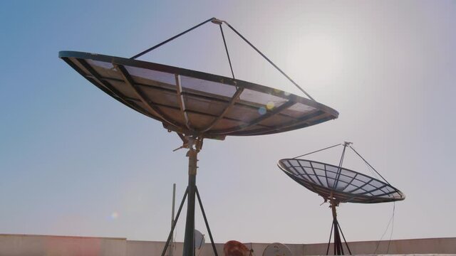 Rooftop satellite dishes panning shot, Shot on RED Helium 8K with 18mm lens
