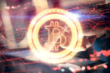 Double exposure of man's hands holding and using a phone and crypto currency blockchain theme...