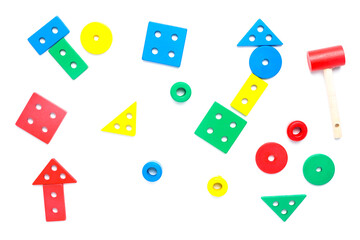 Flatlay of wooden montessori educational toys shape on isolated white background.