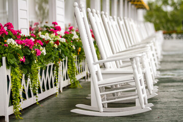 White Rocking Chairs on Long Porch