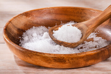 Magnesium chloride in the wooden bowl - Text space