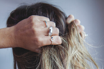 young woman with rings