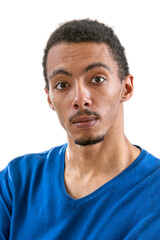 Head and shoulders portrait of young African American man wearing Sweater serious face