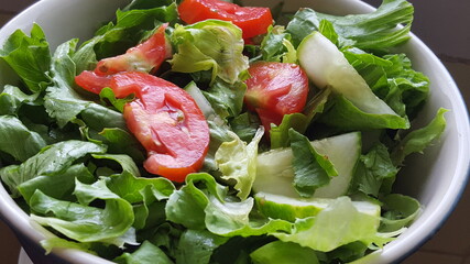 A bowl of salad ingredients 