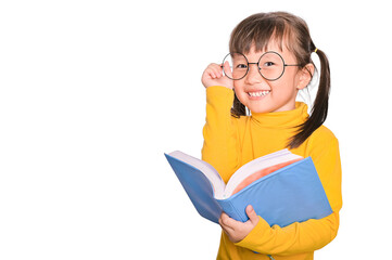 Adorable and cheerful Asian kid little girl wearing glasses reading interesting book being involved in education isolated on white background