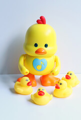 Big toy duck yellow with small duck yellow made from plastic for children, has a music and can dancing. Funny toy for development the kids. Learning and listening for kid concept isolated in studio.