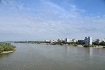 Fototapeta na wymiar View of Irtysh River divides the city into two parts Omsk