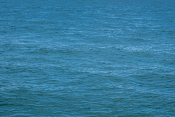 Blue sea surface with wave. Abstract background.