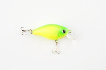 Fishing lure with hooks isolated in white background