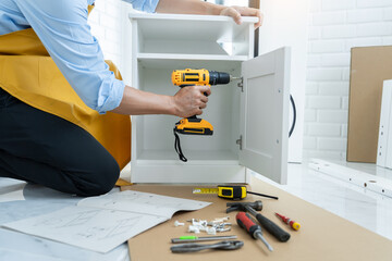 worker with drill