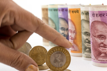 Fototapeta premium Indian coins and papaer currency in display