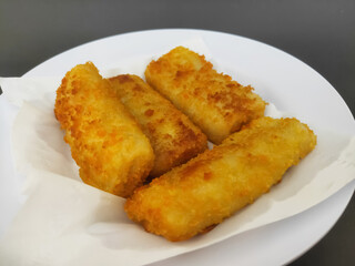 Fried Risoles with Chili on Black Background. Blurry Background