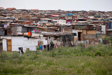 Segregation is no longer the law, however, many black South Africans live in shantytown townships...