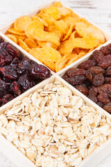 Healthy nutritious dried fruits with flakes as source vitamins, carbohydrates and dietary fiber