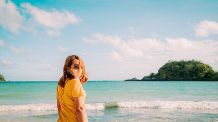 young woman travel on the beach in Thailand