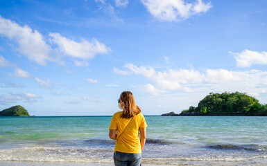 young woman travel on the beach in Thailand