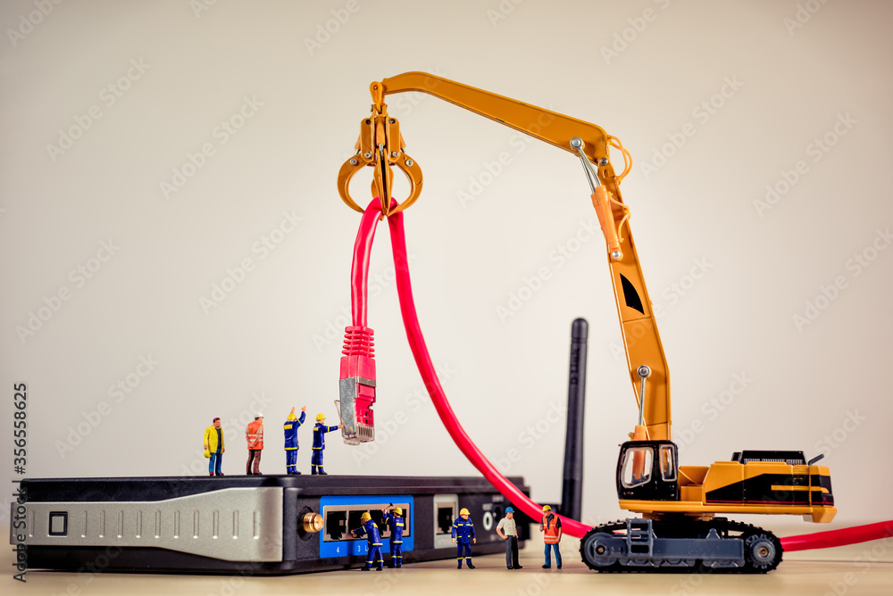 Poster network engineers setting up a network connection