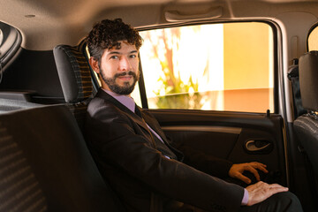 Business man in application car.