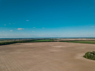 Agricultural empty field, no crop. Aerial photography