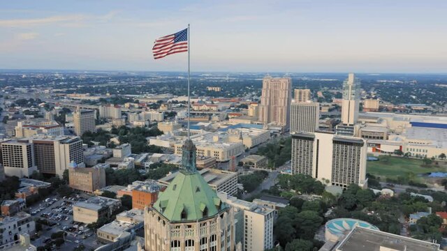 Aerial: American flag in Downtown San Antonio. Texas, USA