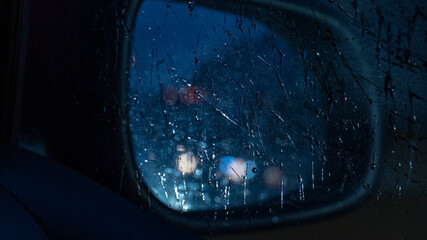 rearview mirror in the rain
