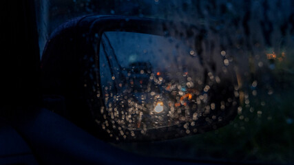 rearview mirror in the rain