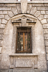 Fototapeta na wymiar Old Brutal Window in Milan.