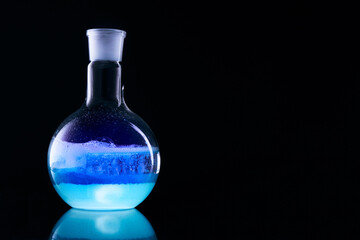 Obraz na płótnie Canvas Glass flask with a chemical reagent.