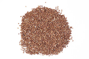 a pile of buckwheat grains on an isolated background