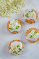 home made elderflower lemon cupcakes on a table