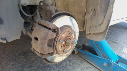 Fototapeta premium Seasonal wheel change in tire repair