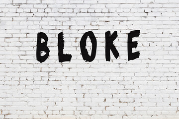Word bloke painted on white brick wall