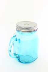Blue glass mug with lid and hole for straws for smoothies and drinks