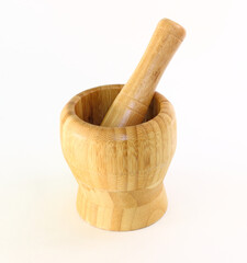 Wooden mortar with pestle for grinding spices and solid foods