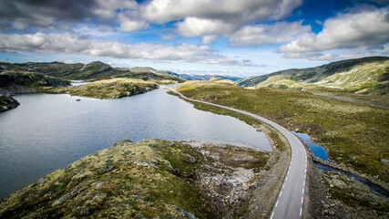 The road to the top of the mountains. Empty road of Norway.
