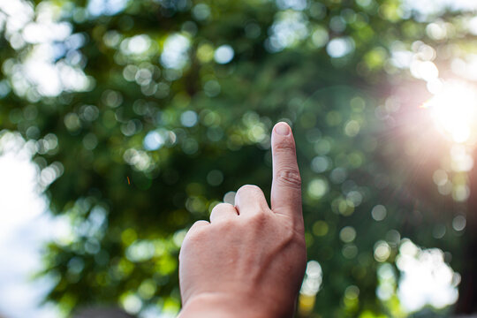 Technology, hand holding with environment Icons over the Network connection on green background. - Powered by Adobe